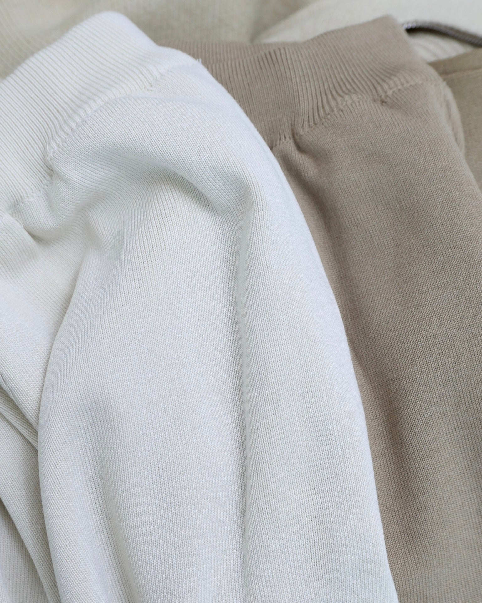Close-up of white and beige fabric texture