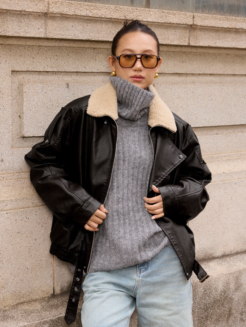 Leather jacket with faux fur collar