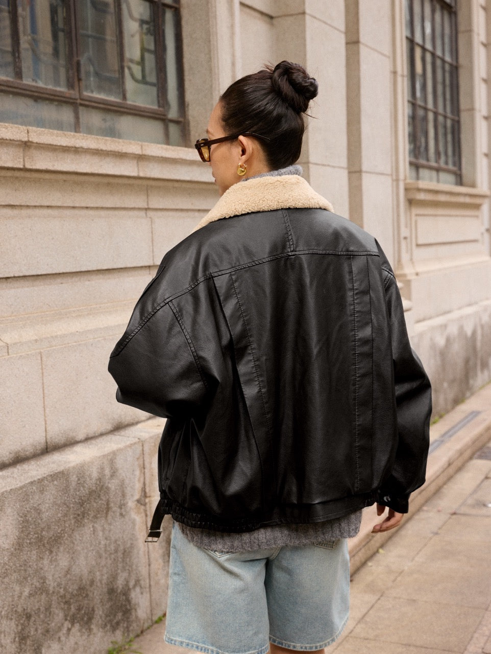 Leather jacket with faux fur collar