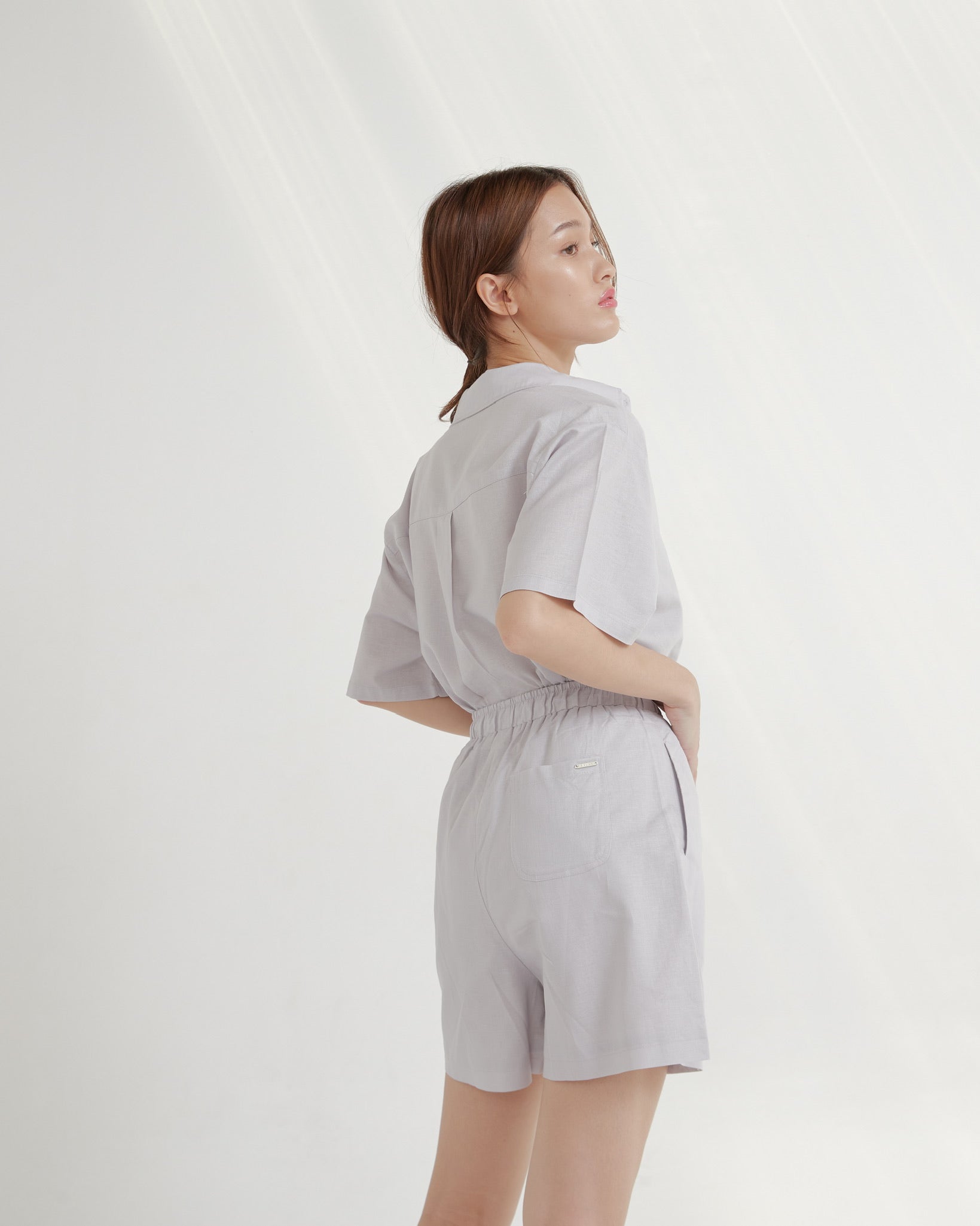 Woman wearing a Taro outfit on a white background